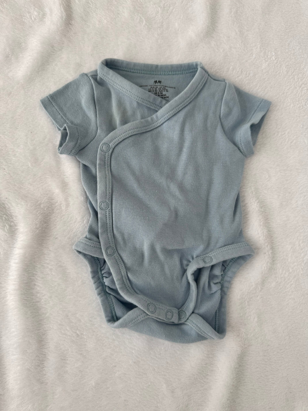 H&M 0-1 mois *petite tache