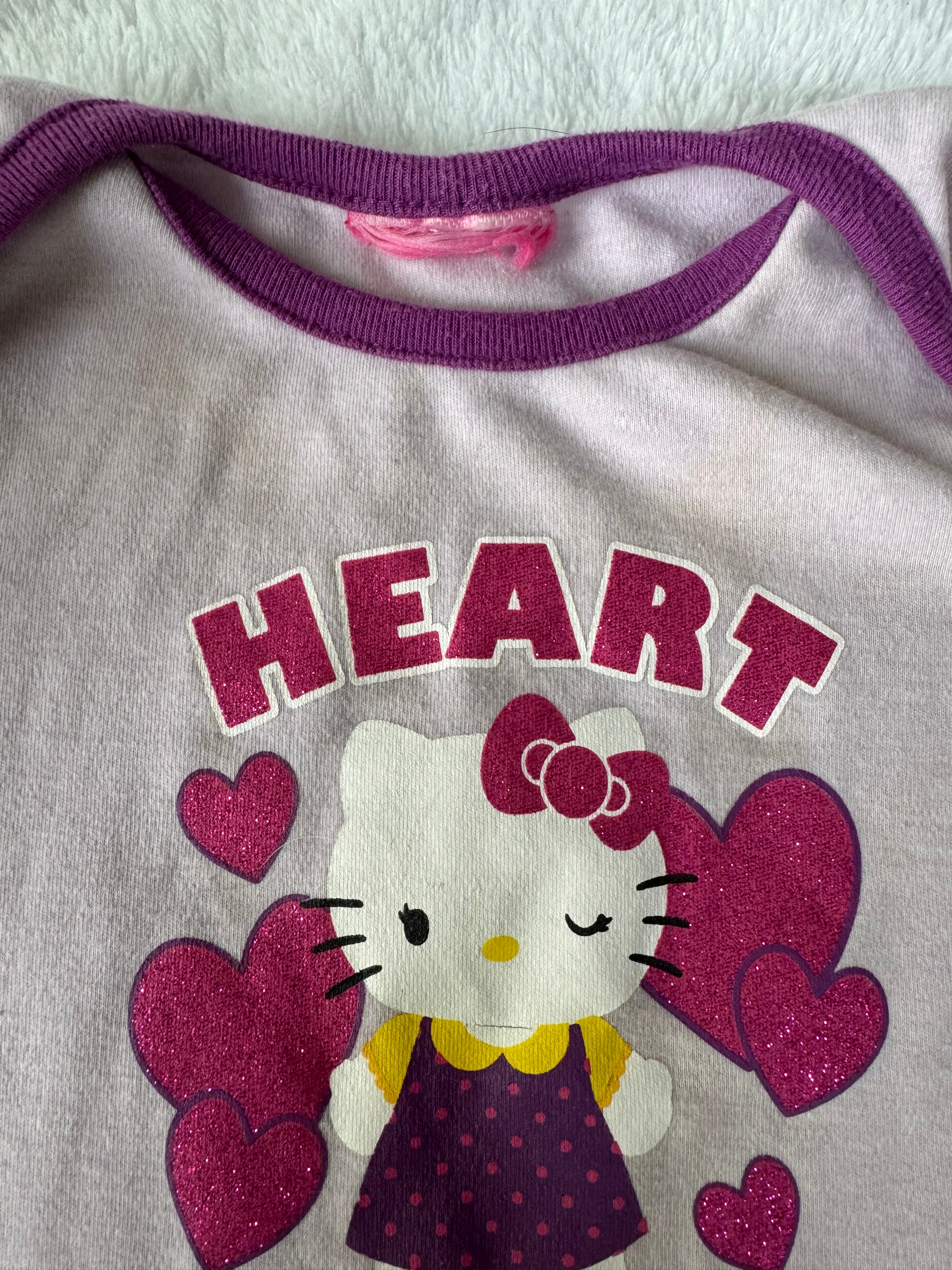Hello kitty fait 12-18 mois *plusieurs taches