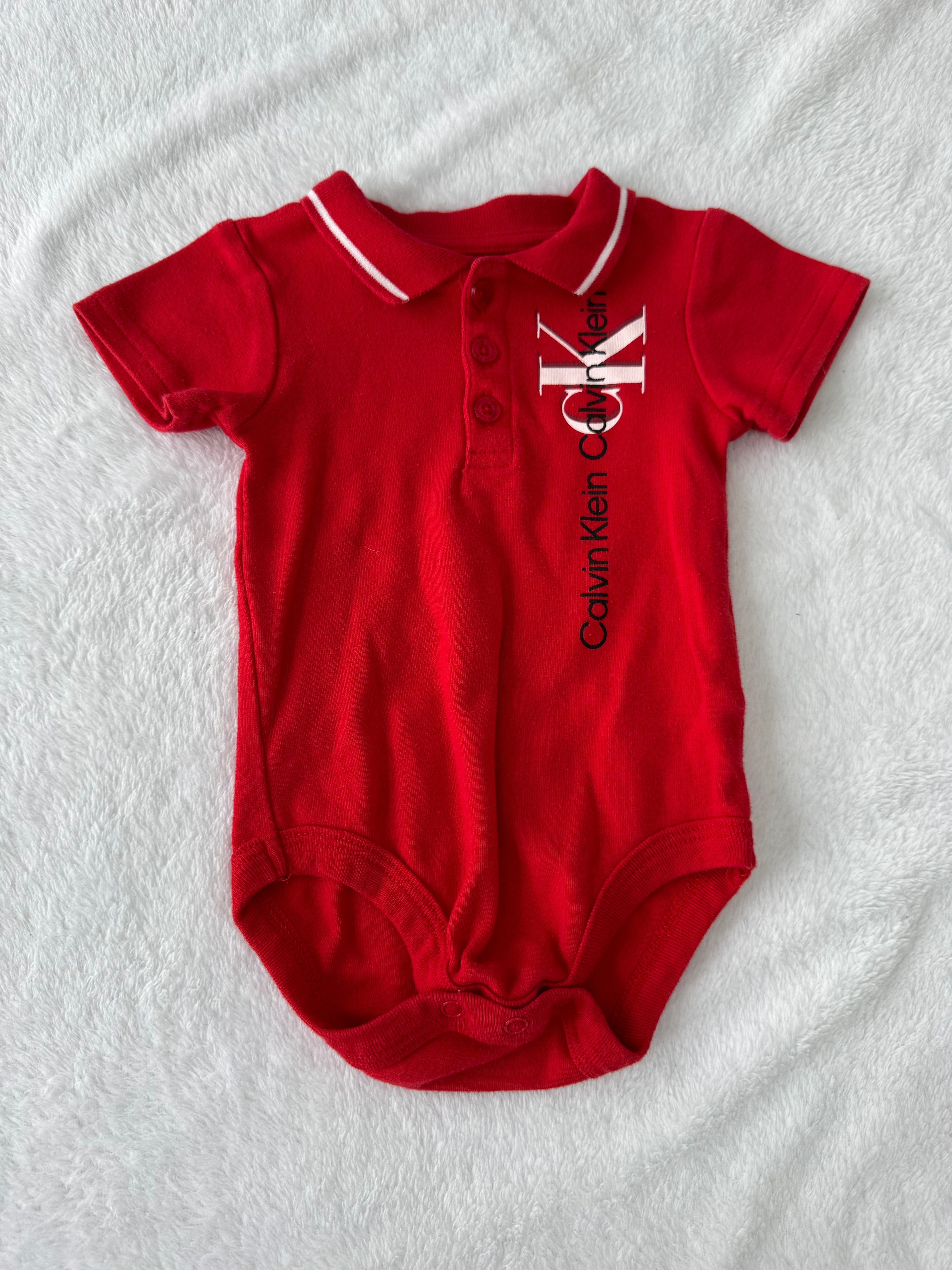 Calvin Klein 6-9 mois *mousseux