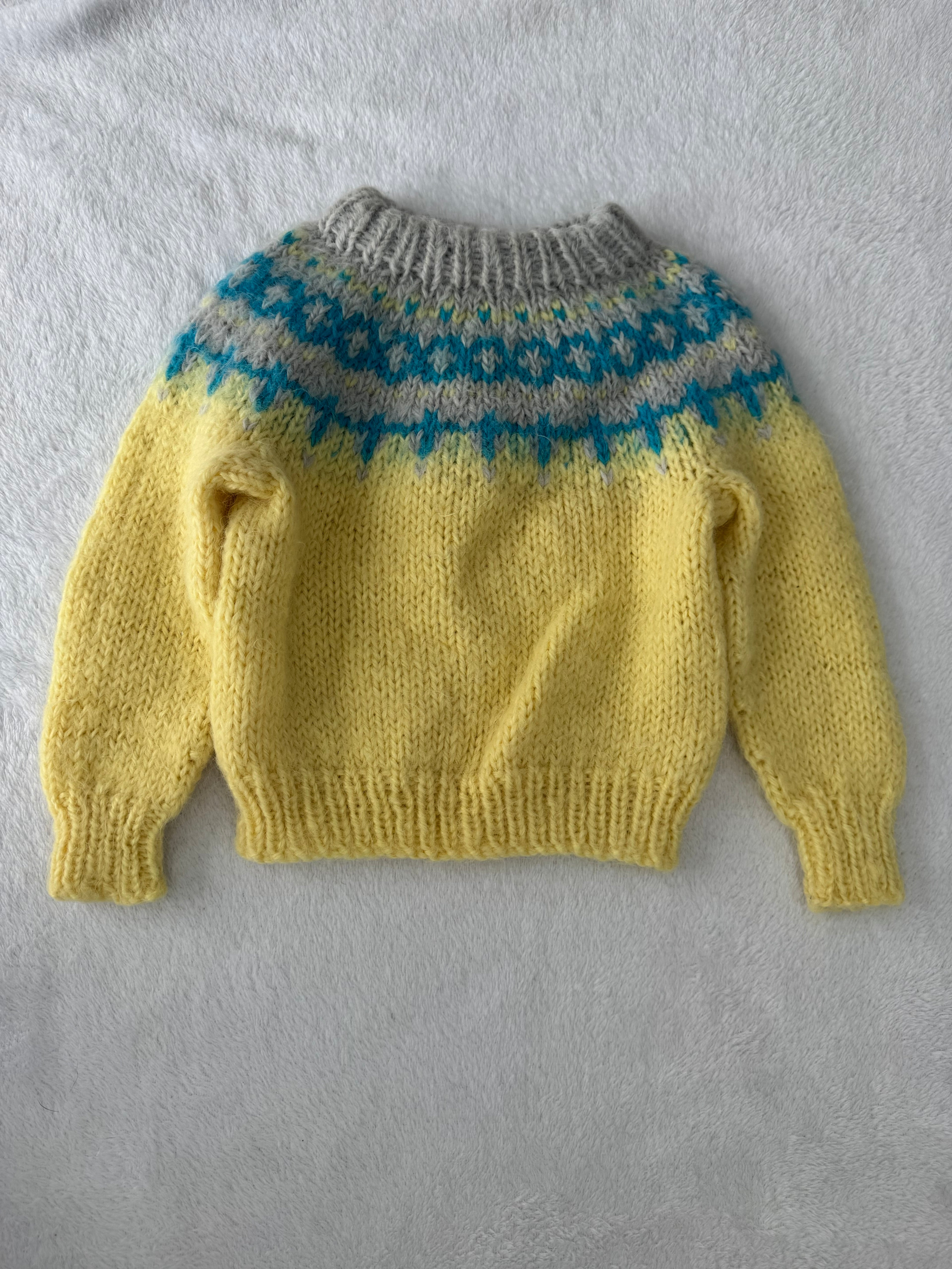 Fait à la main par lise, fait 12-18 mois