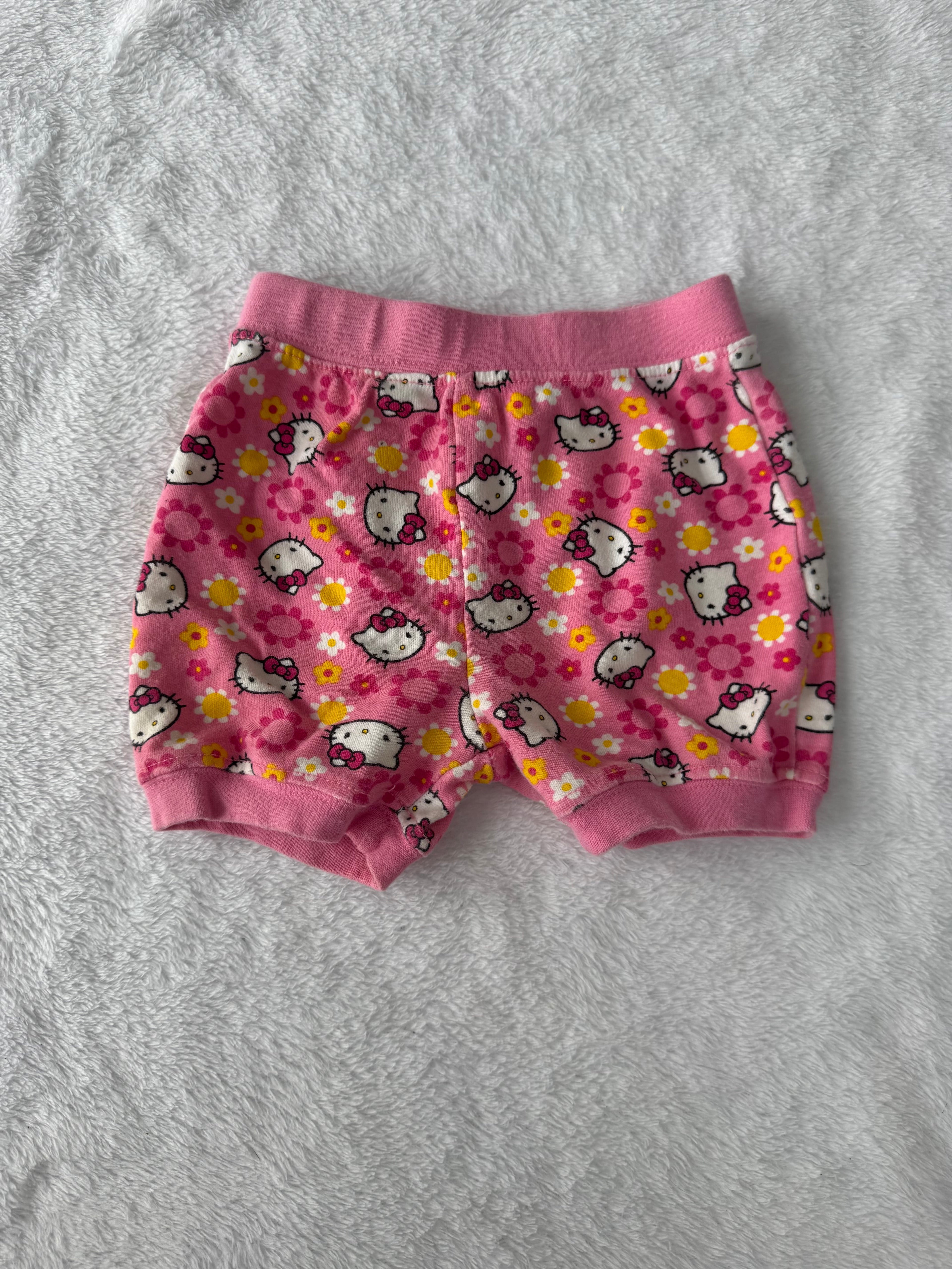 Hello kitty 6-12 mois *un peu mousseux