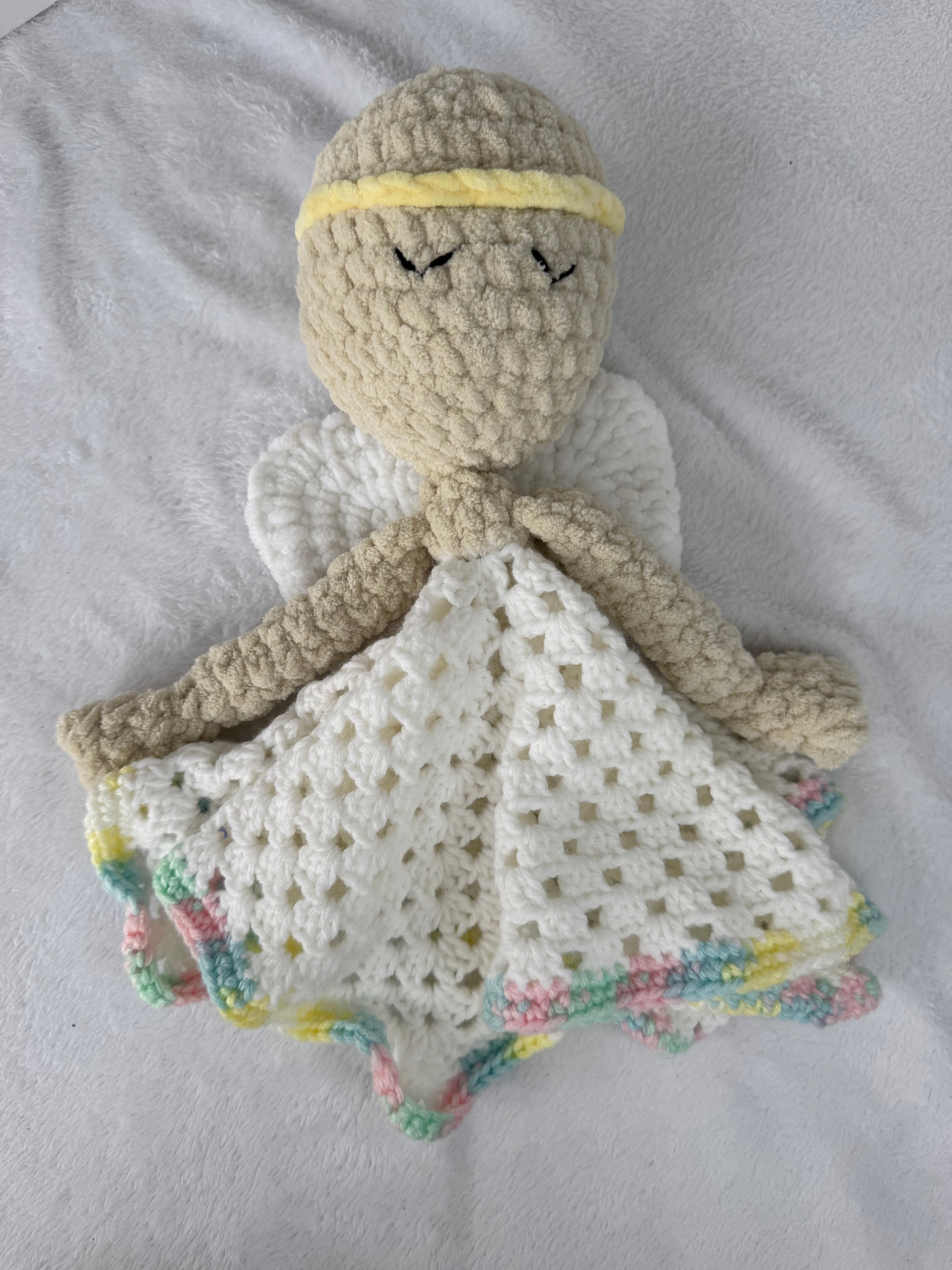 Bébé ange doudou