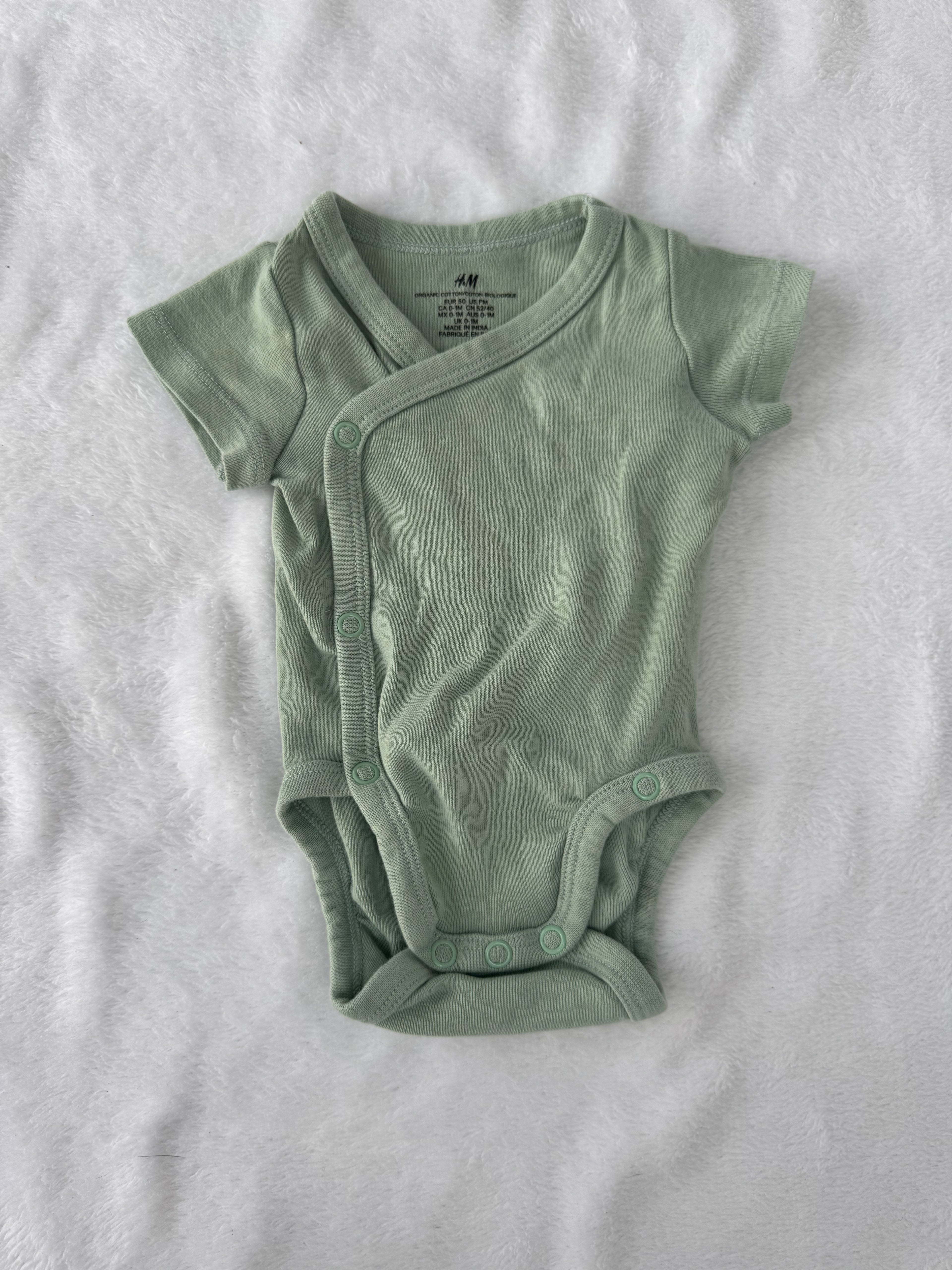 H&M 0-1 mois *petite tache